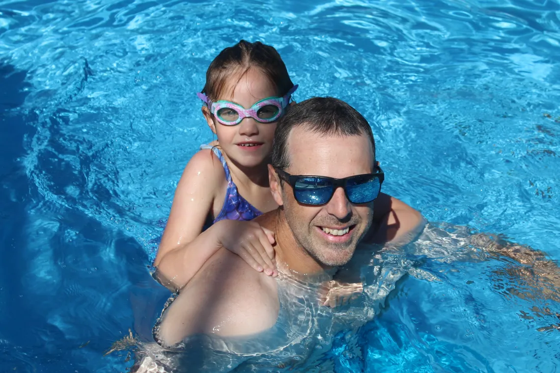Two people in a swimming pool
