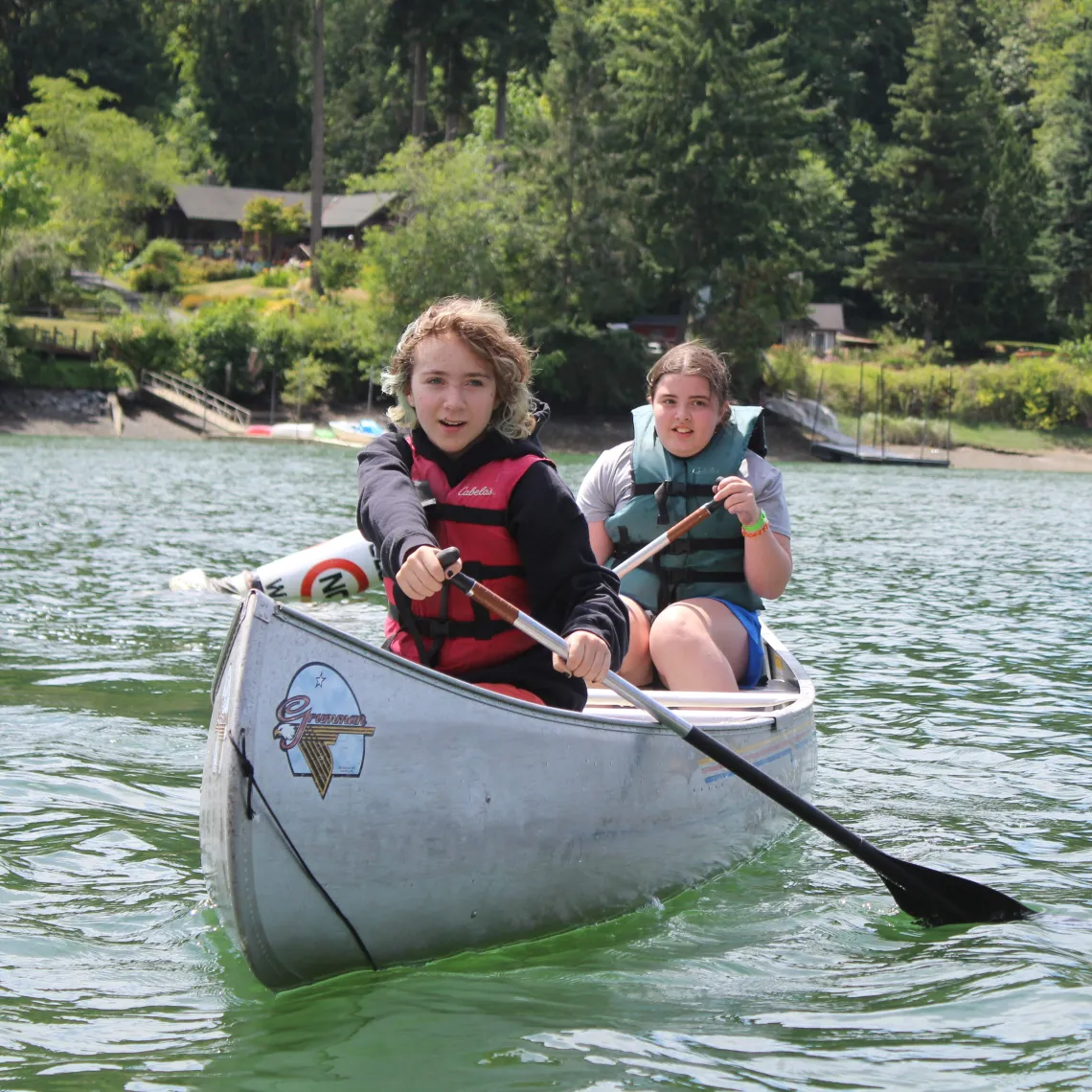 Two campers in a canoe