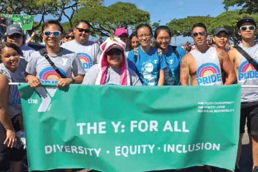 A group of YMCA members and staff celebrates Pride in Pierce County