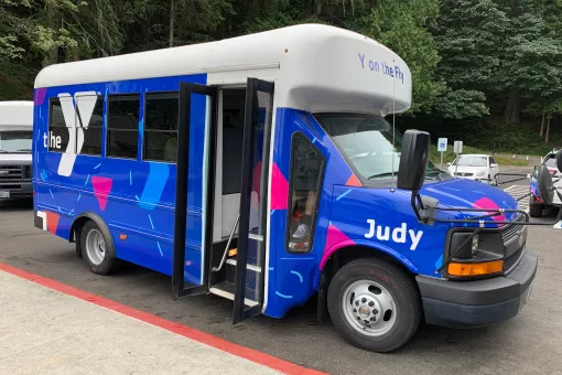 A bus with the name Judy on the side is parked in Tacoma, Washington.