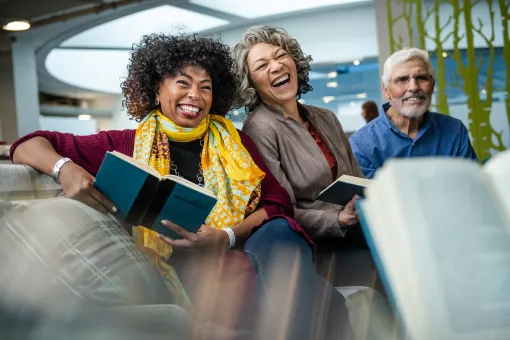 Older Adults Laughing at YMCA Book Club