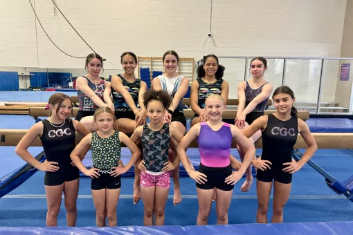 Gymnastics team poses for a team photo at the YMCA