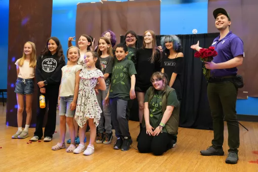 A group of youth theatre performers and their instructor, Gunnar