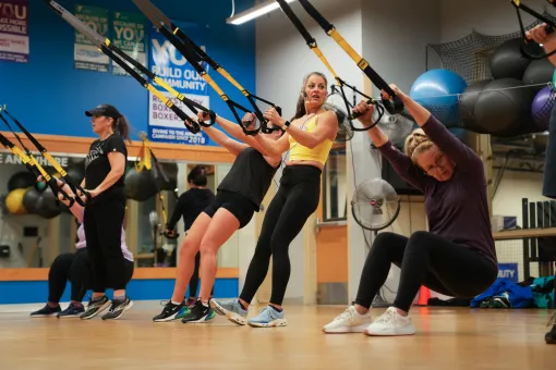 Karen and her class performing squats