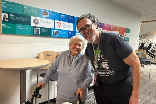Teddy and a YMCA member