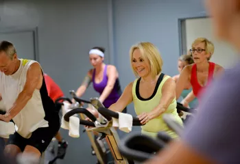 Cycling At A YMCA Group Exercise Class
