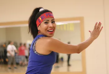 Cardio Dancing At A YMCA Group Exercise Class