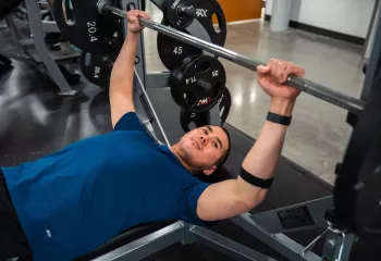 Preparing to Bench Press at YMCA Gym