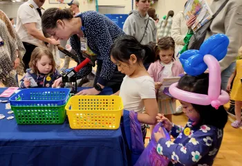 Shot of the button making table at Healthy Kids Day at the YMCA
