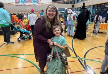 Parent and Dinosaur Rider at Jack-O’-Lantern Jubilee