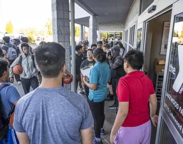 Late Nite participants line up outside the door of the Lakewood Family YMCA