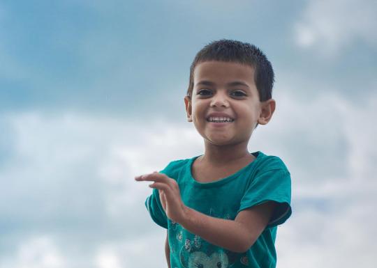 Smiling Running Child At YMCA Summer Day Camp