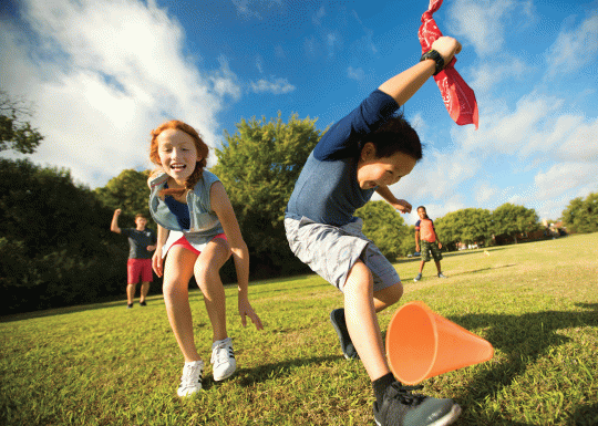 Two Kids Playing in a Field