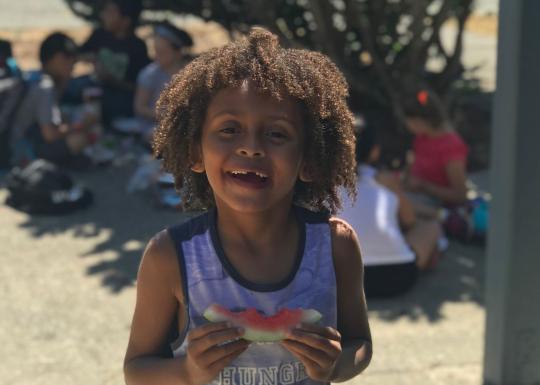 Enjoying Watermelon At YMCA Summer Day Camp
