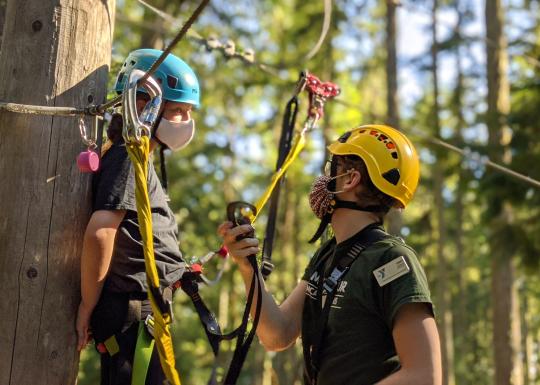 Safely Zip Lining At YMCA Camp Seymour In Accordance To Guidelines