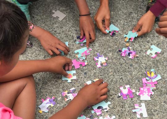 Community Outreach Putting Puzzle Together