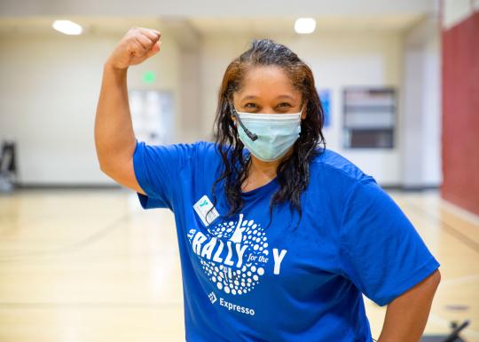 Flexing Muscles in Group Exercise Class At The Lakewood Family YMCA