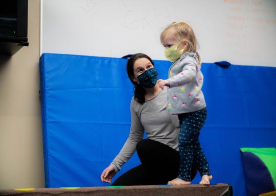 ymca-toddler-gym-balancing-with-parent.jpg