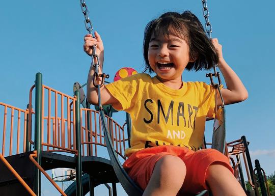 Healthy Kids Day At The YMCA Girl On Swing