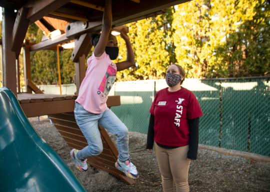 Playing on Monkey Bars at YMCA Early Learning Center