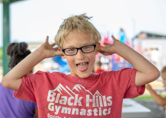 Boy-Making-Faces-At-YMCA-Summer-Day-Camp.jpg Boy Making Faces At YMCA Summer Day Camp