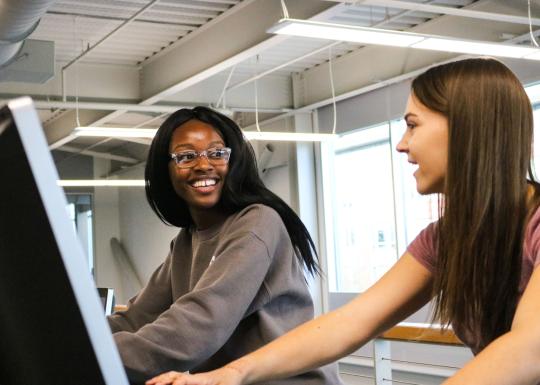 Friends Talking On Treadmill At The YMCA