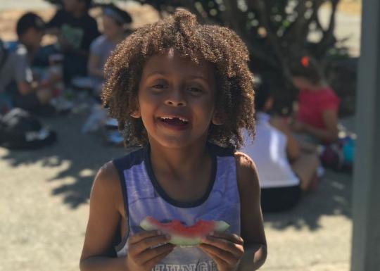 Enjoying Watermelon At Summer Day Camp