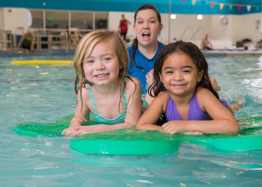 Practicing Paddling At YMCA Aquatics Swim Lessons