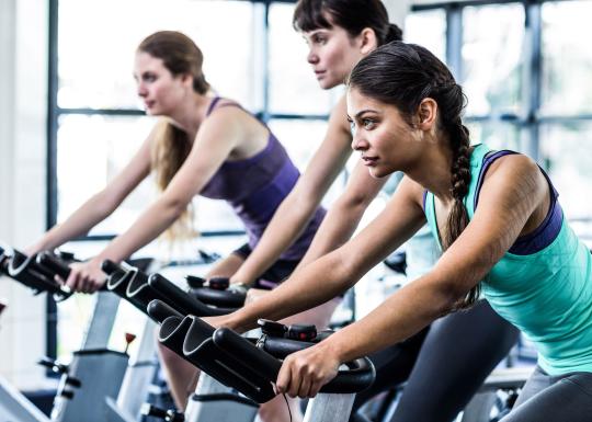 Focused Participants At YMCA Cycling Class