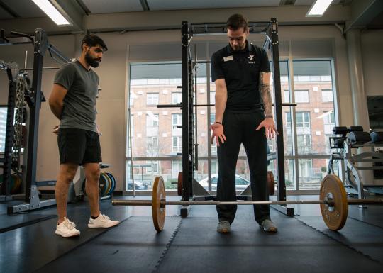 Kickstart trainer demonstrating deadlift form