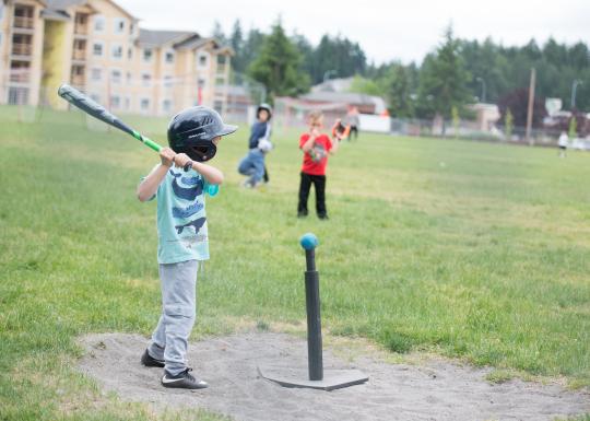 Tee-ball player up at bat