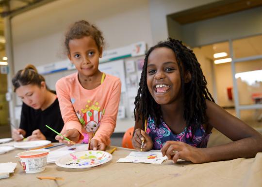 Friends Painting Together at YMCA Visual Arts Class