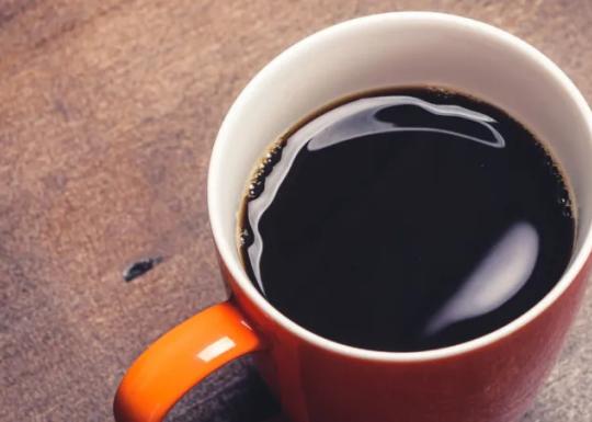 Close up image of a cup of black coffee