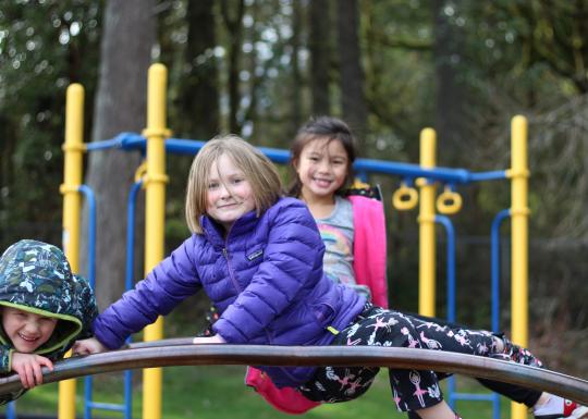 Hanging Out on Jungle Gym at Local YMCA School Camps