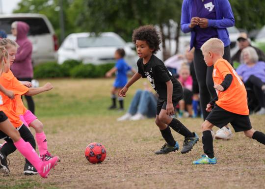 Action shot of a soccer game at the YMCA