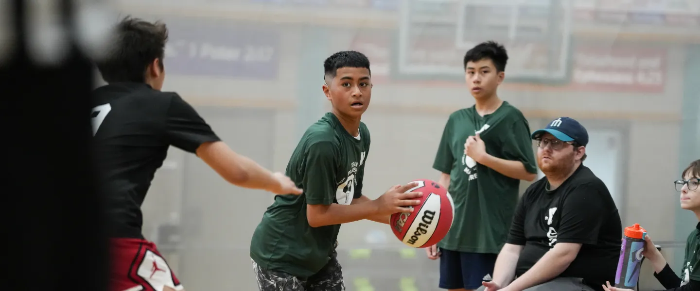 Action shot of a basketball game at the Mel Korum Family YMCA