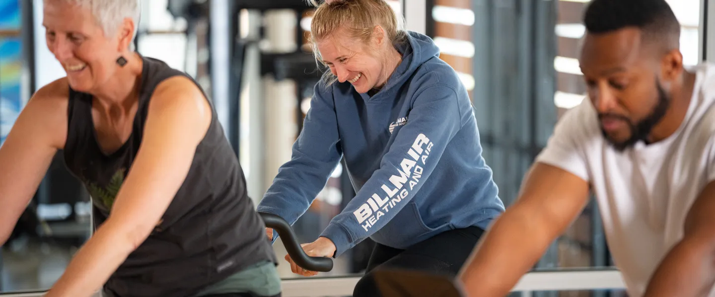 Group Laughing in YMCA Cycling Class