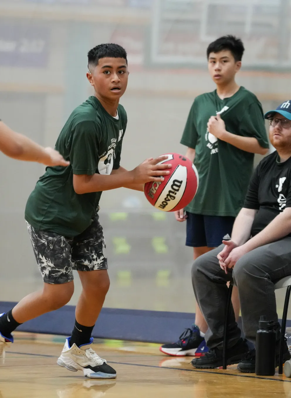 Action shot of a basketball game at the Mel Korum Family YMCA