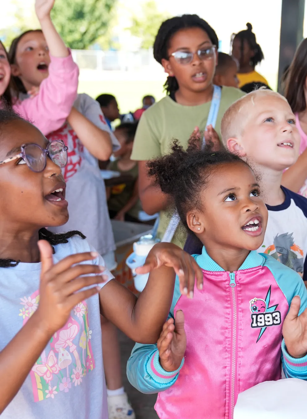 Clapping at YMCA Summer Day Camp Campfire Activity