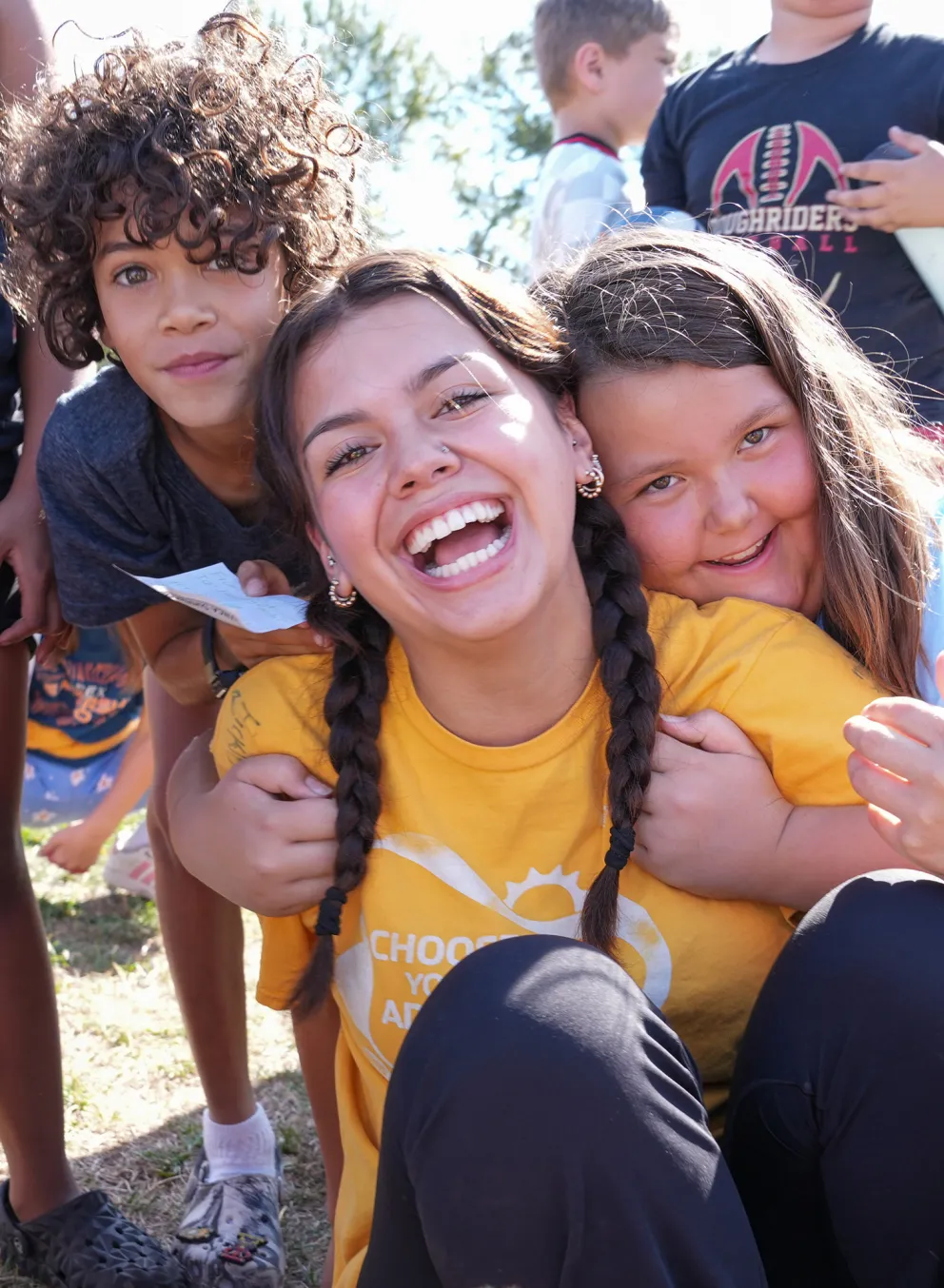 YMCA Summer Camp Counselor Posing with Campers