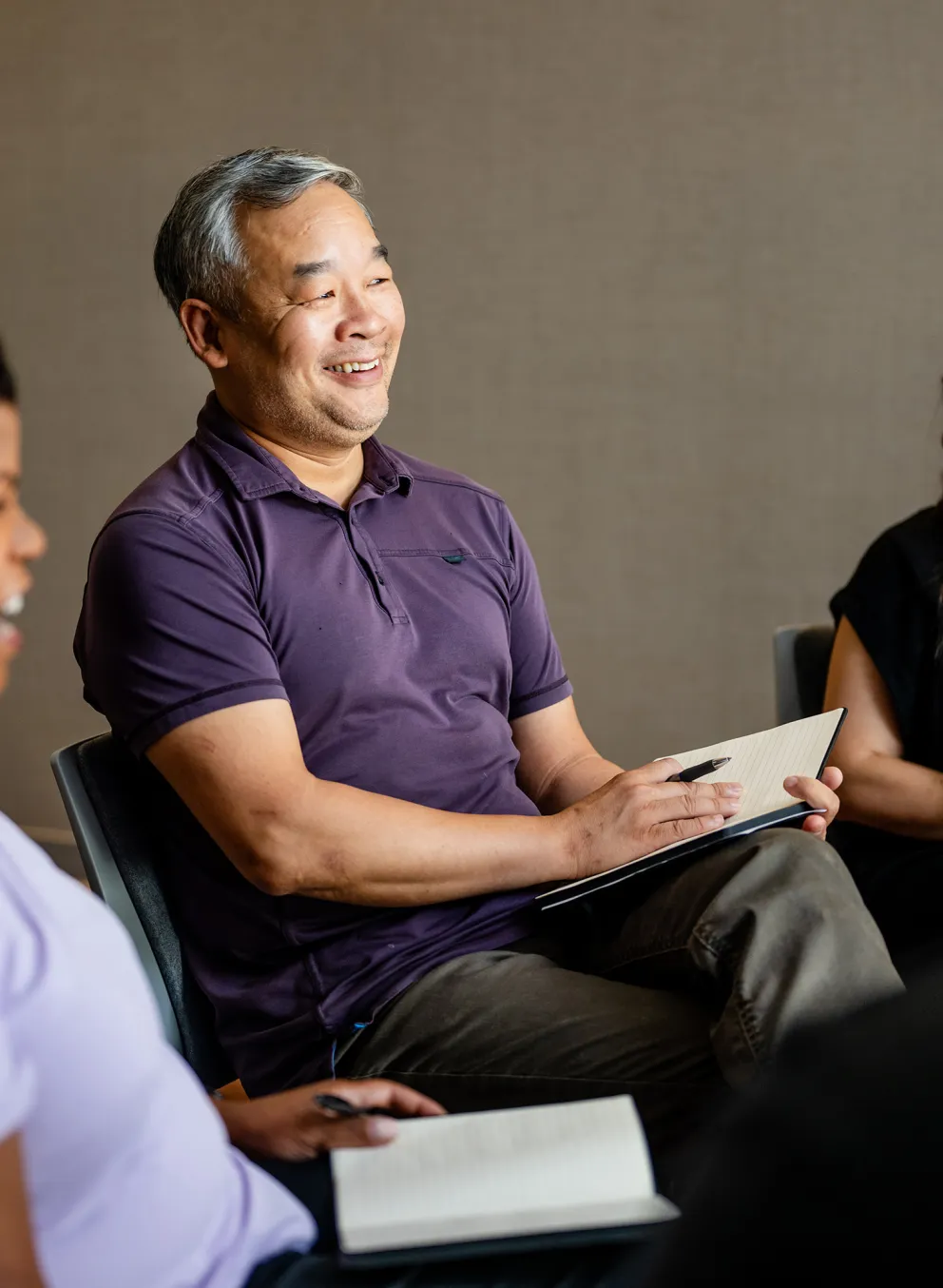 Man and Women Having Group Conversation at YMCA Community Center