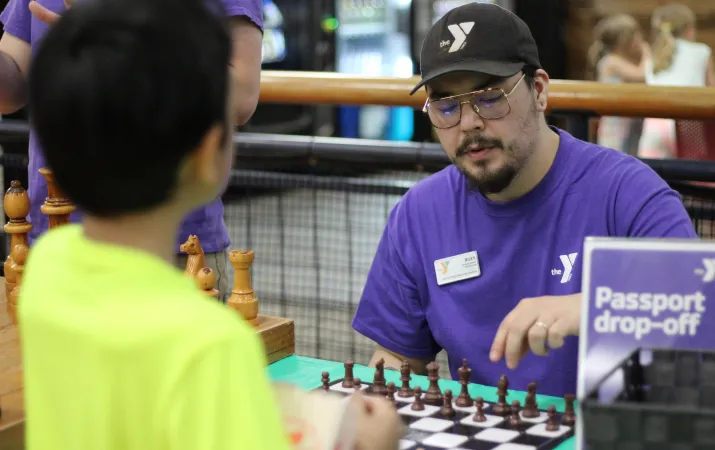 Action shot of a chess game during healthy kids day at the YMCA