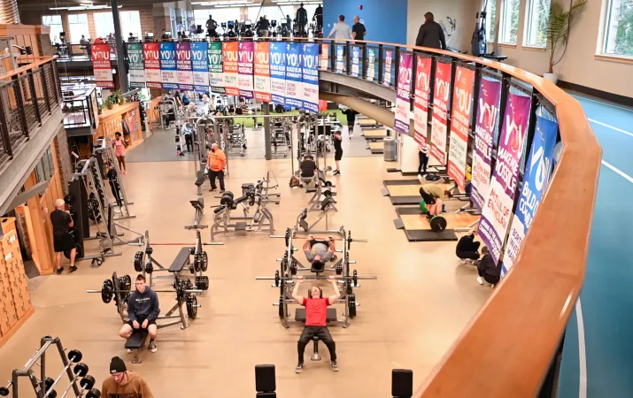 Tom Taylor Family YMCA Weight and Cardio Room with Track