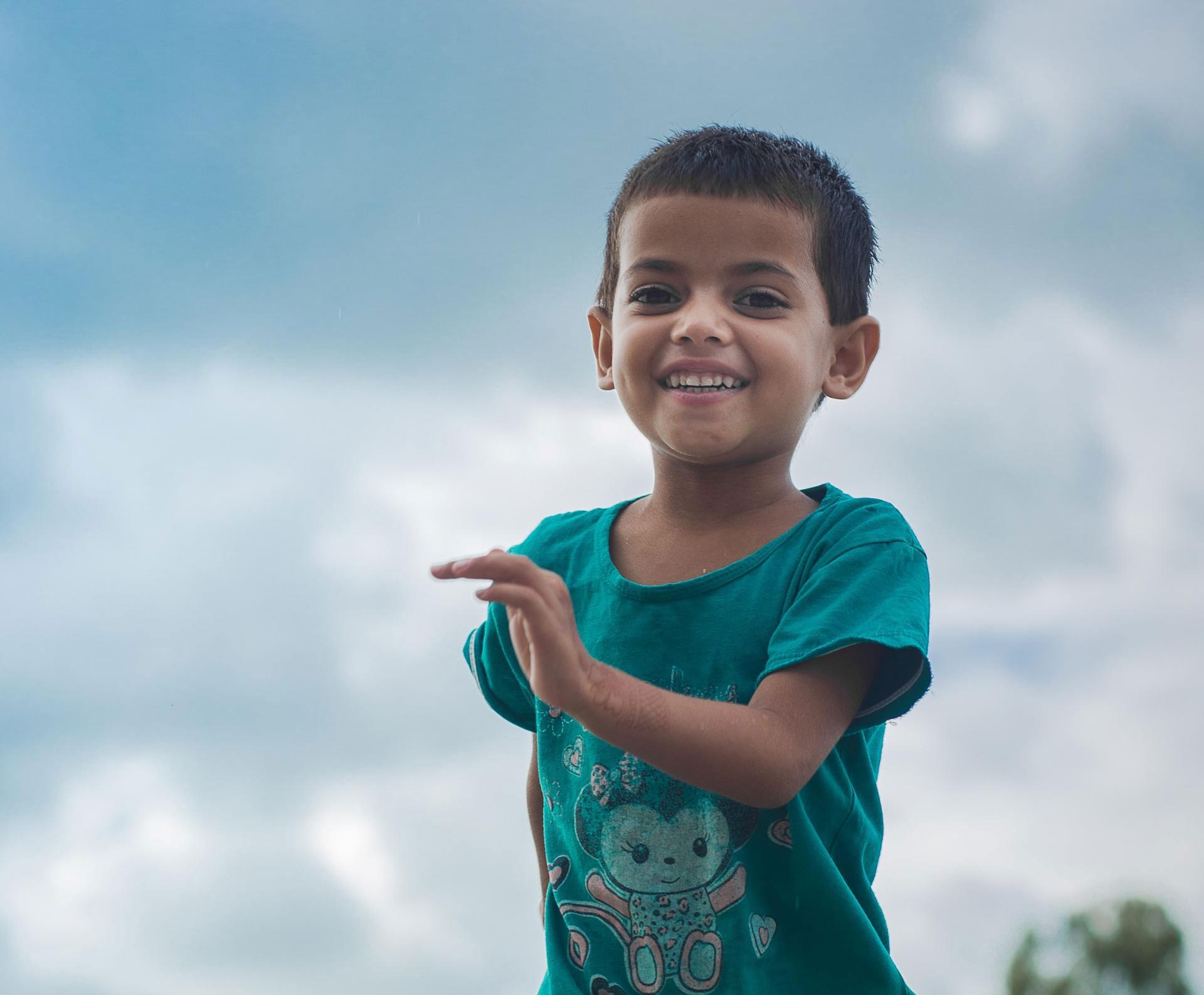 Smiling Running Child At YMCA Summer Day Camp
