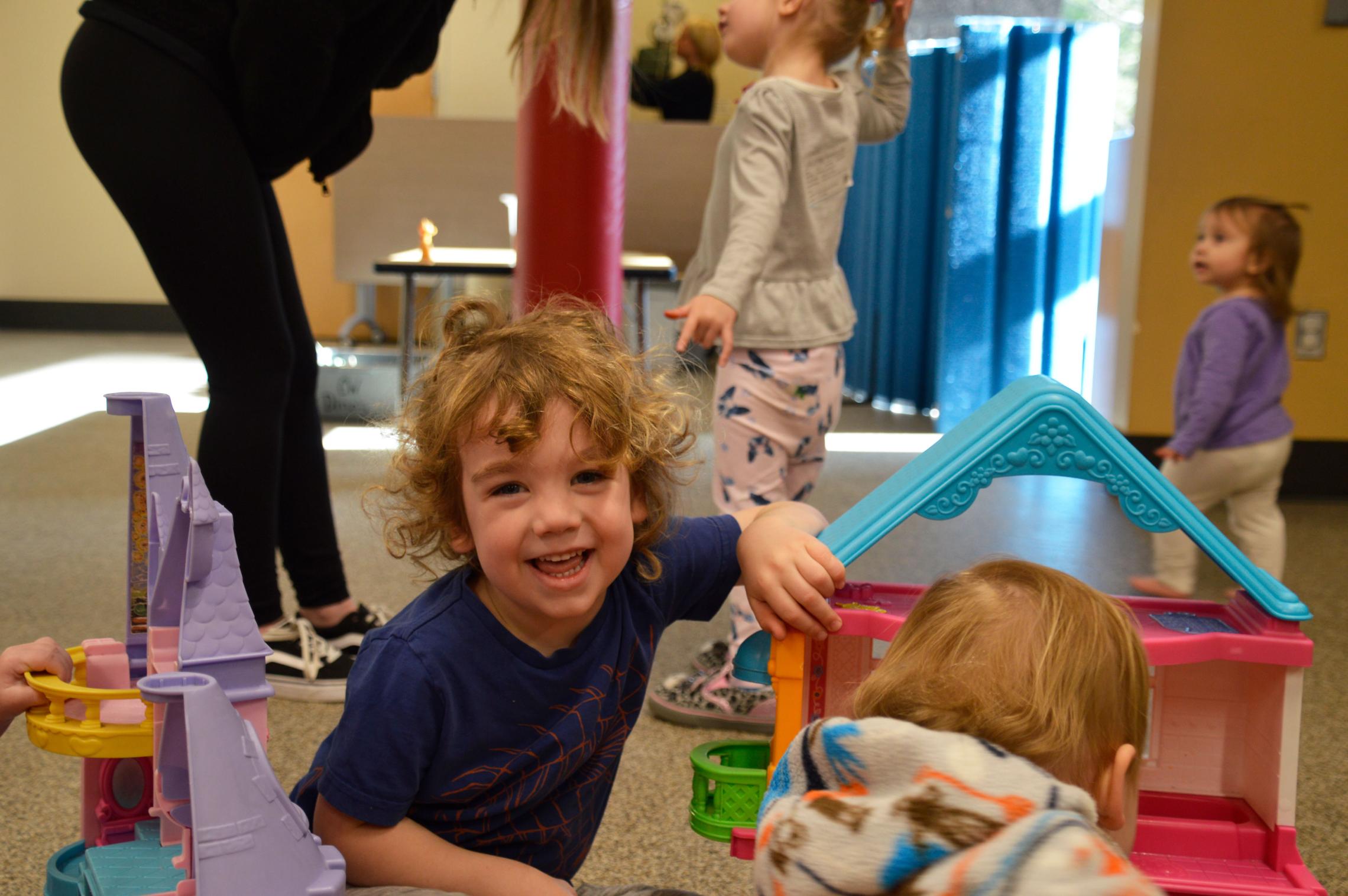 Kids With Playset At YMCA Child Watch