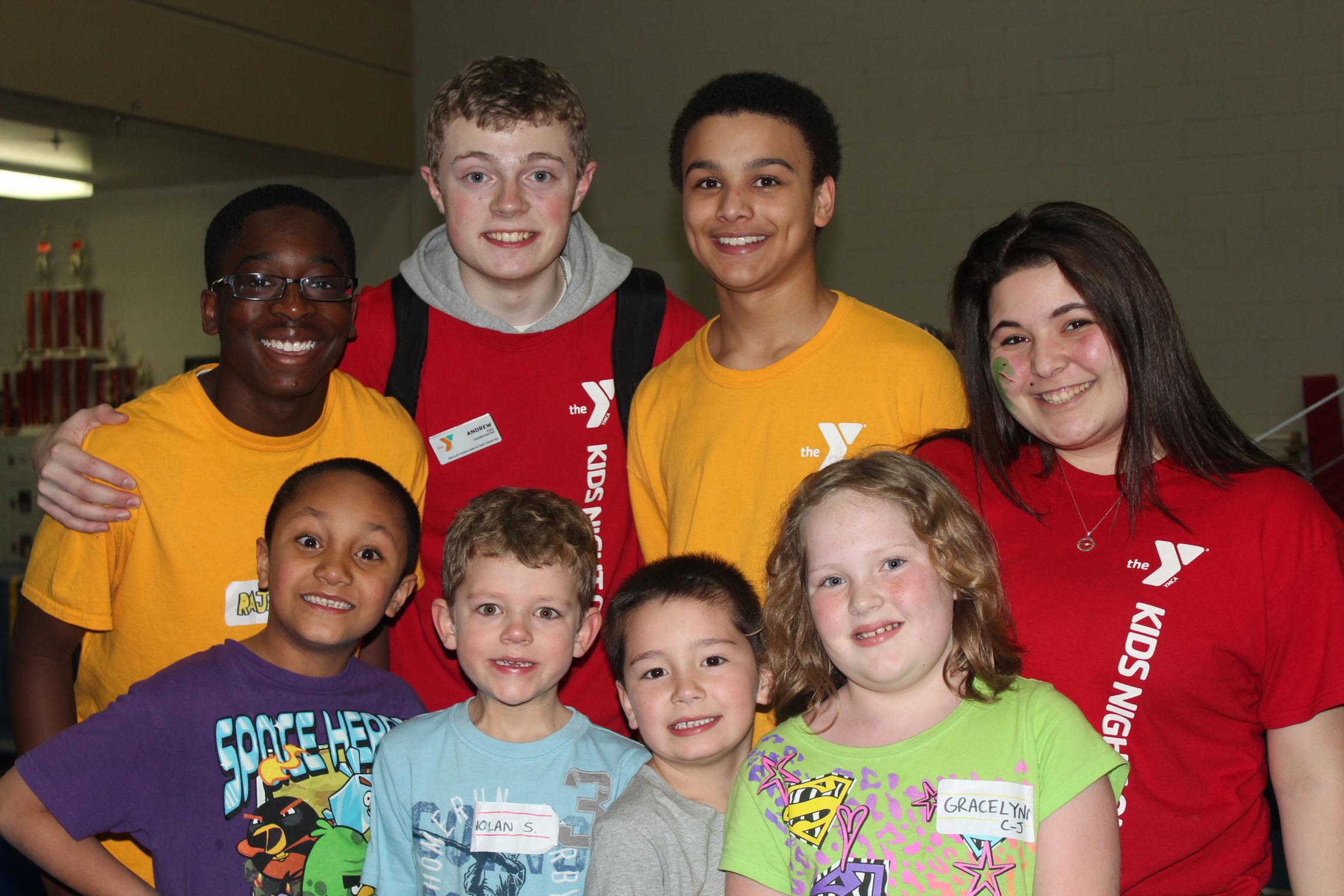 Kids Night Out Leader Posing With Kids