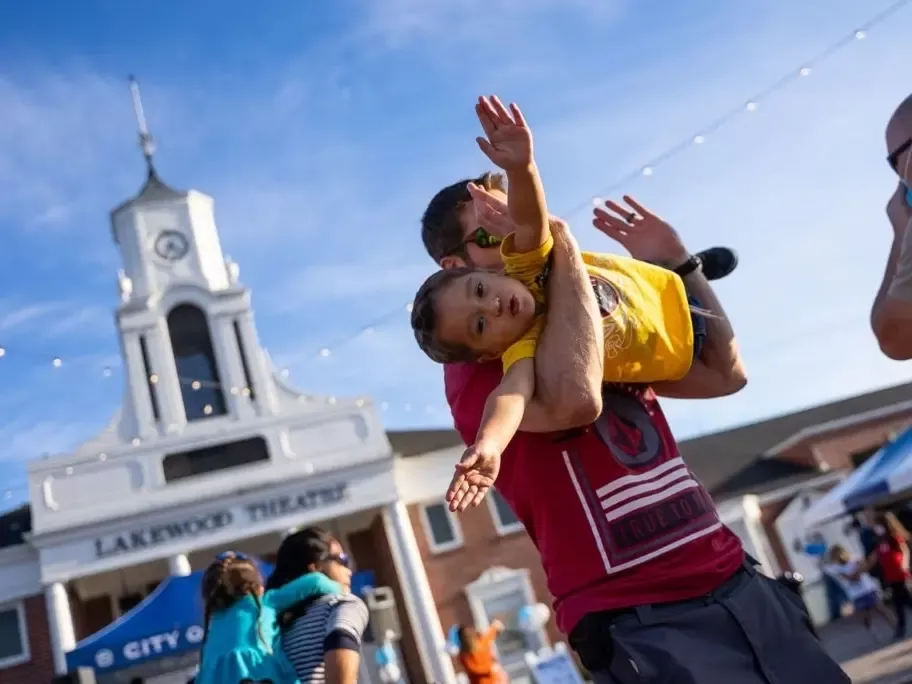 Parent and child at the Lakewood Theatre.