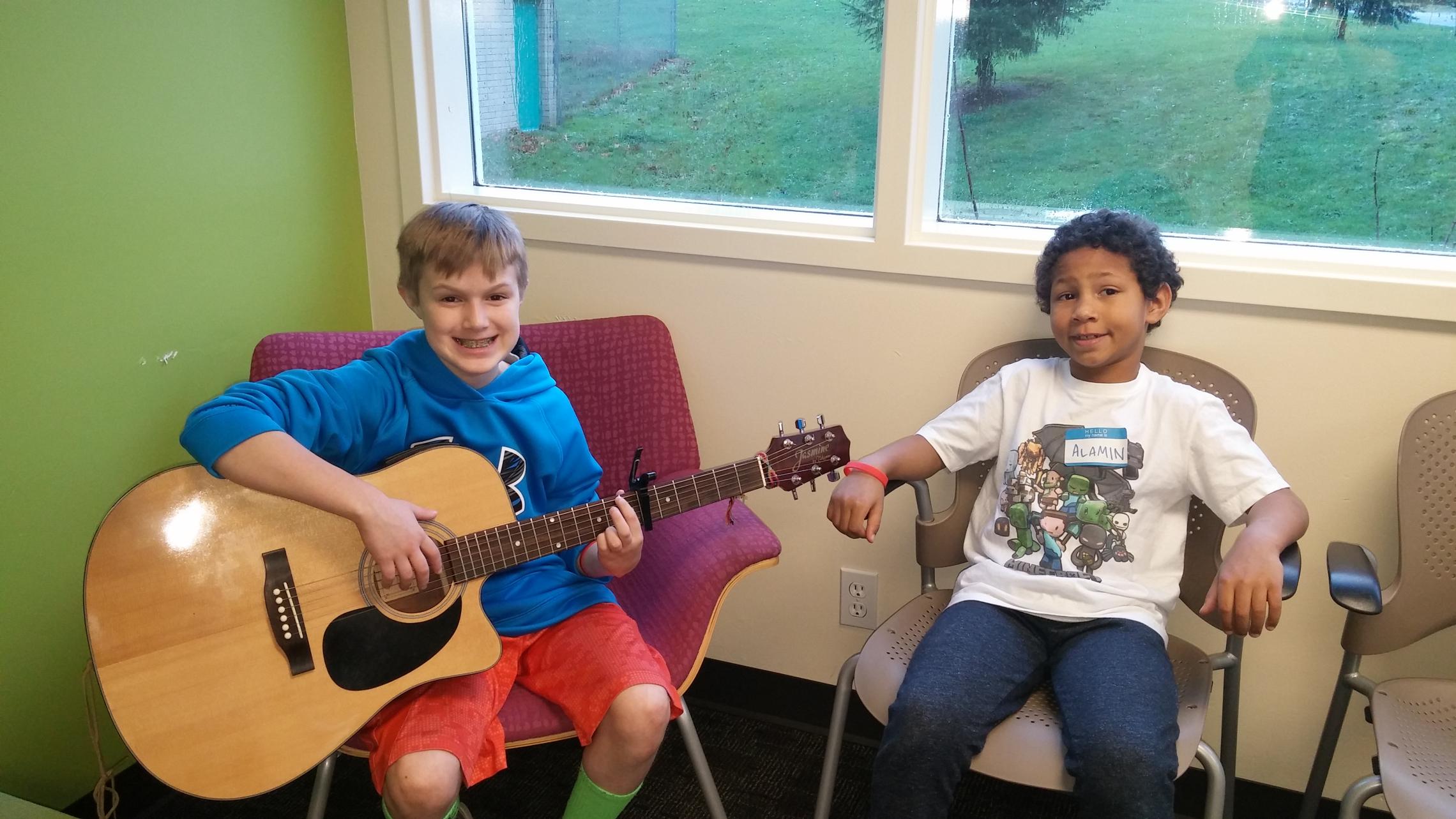 winter break camp kids with guitar