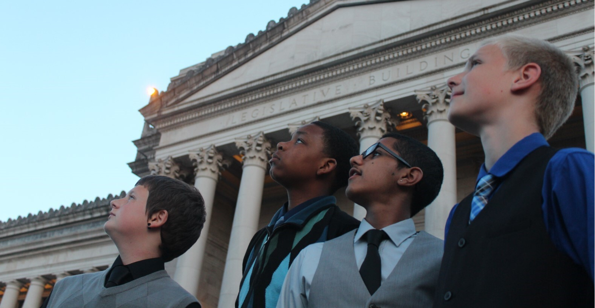 Youth and Government teens posing in front of the state capitol building