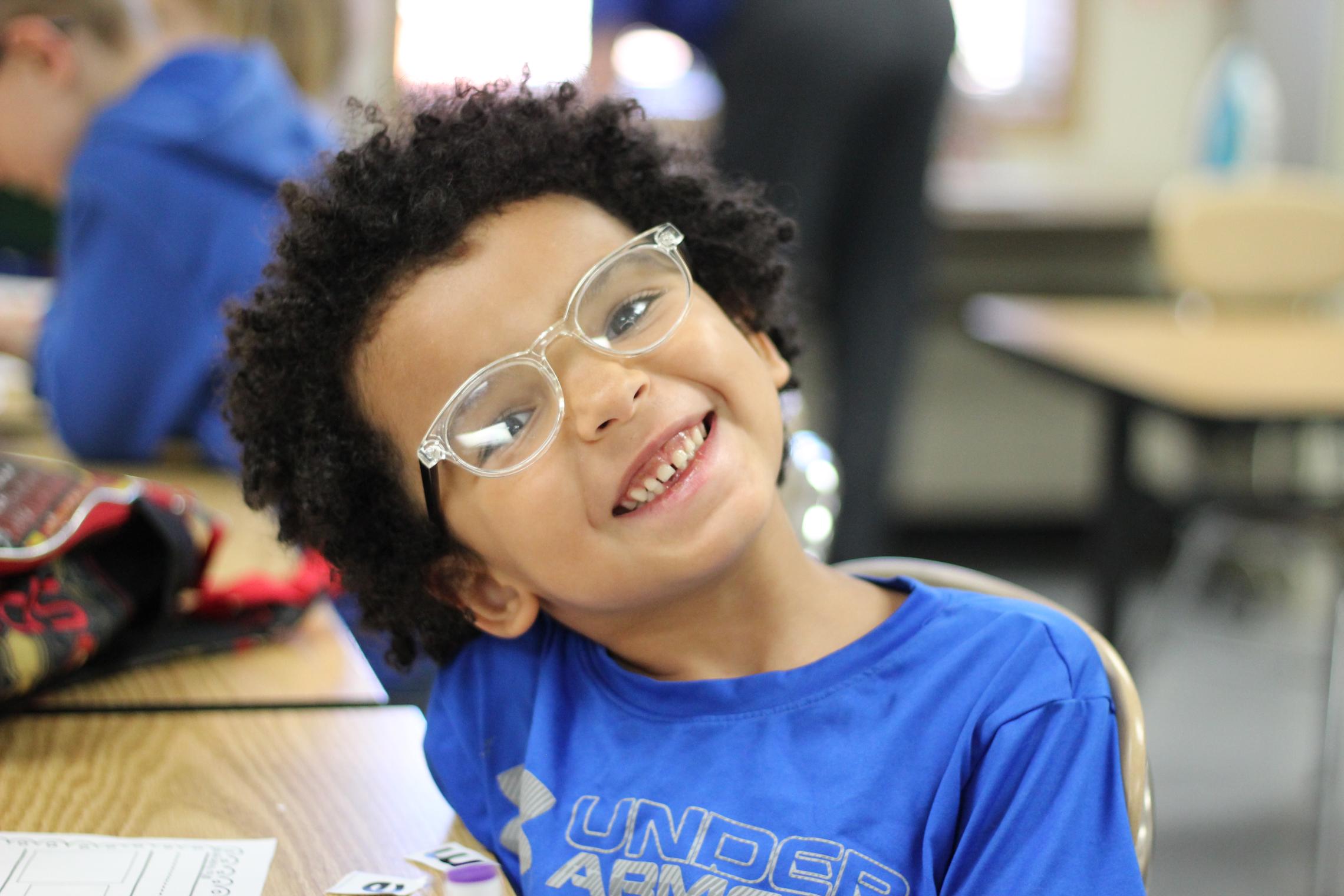 YMCA After School Participant smiling at the After School Tillicum Program